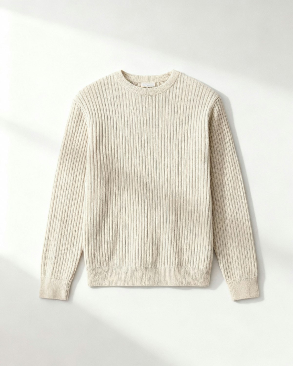 A heavy ribbed crew-neck knit laid flat